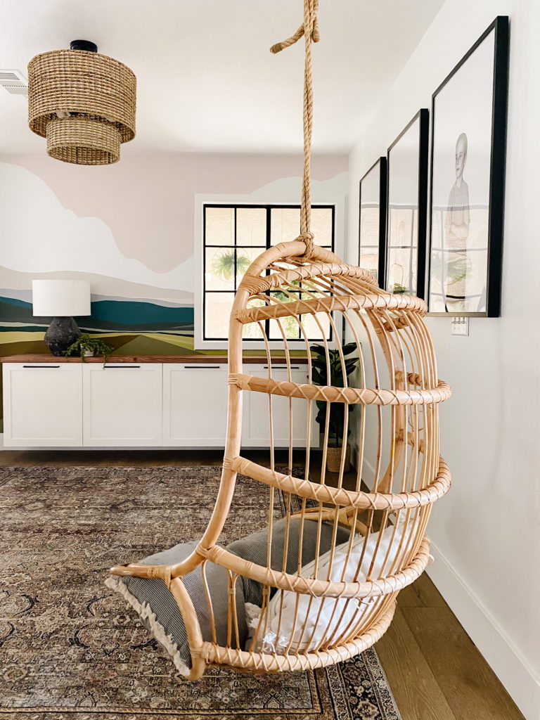 The hanging chair is the final touch to  this room. www.angelarosehome.com