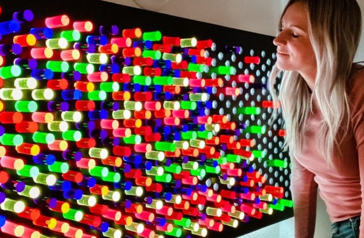 Angela by her giant DIY lite brite