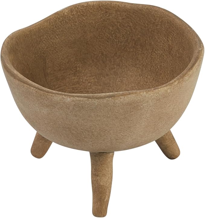 Image of boho terracotta planter used in decoration.