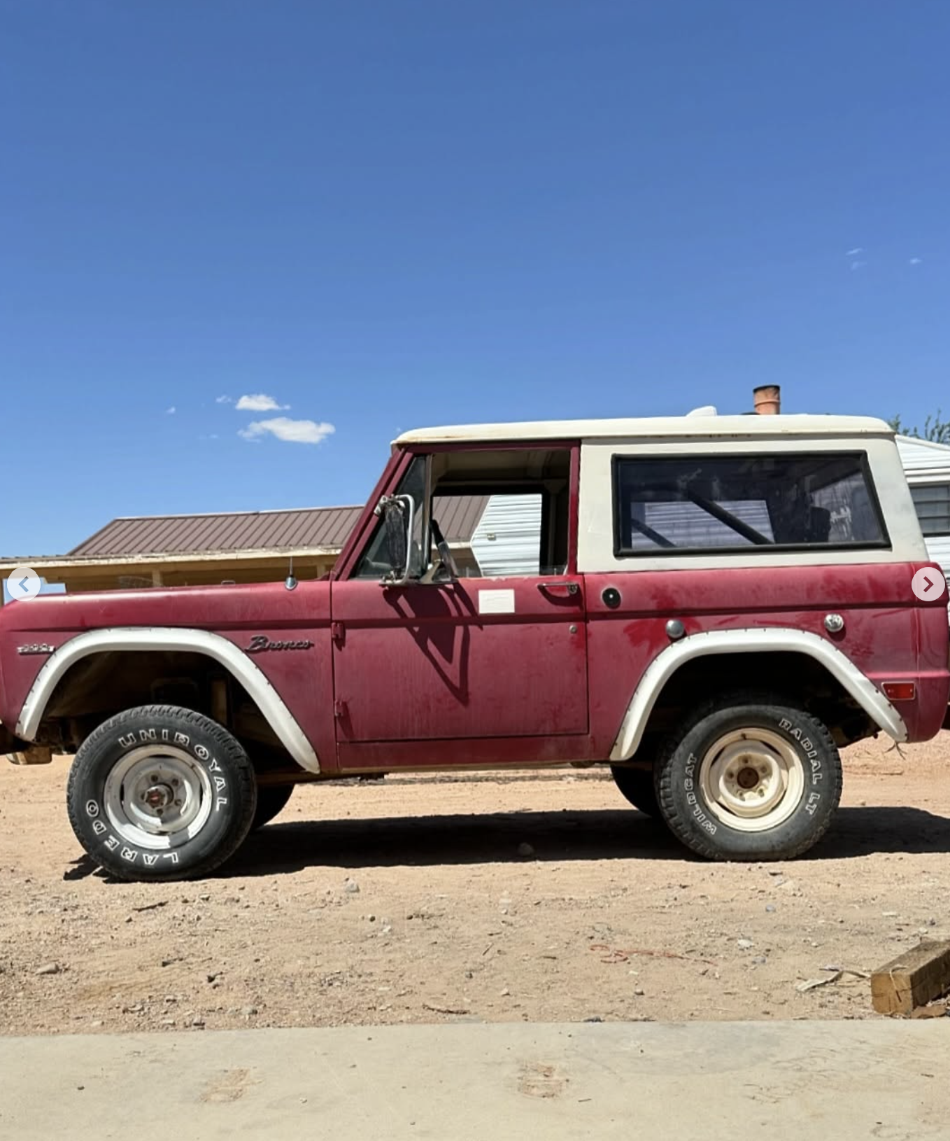 A profile photo of a red vintage 1969 bronco.