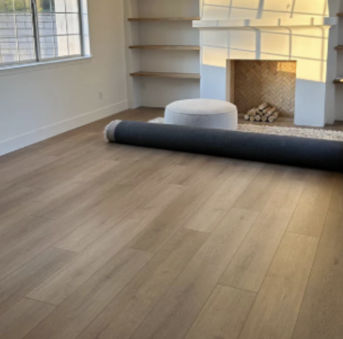 Bring cozy from the ground up. Wide plank flooring and soft rugs add warmth, texture, and the perfect cozy cabin feel to your modern living room